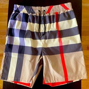 BRAND NEW Burberry summer shorts large fits medium.